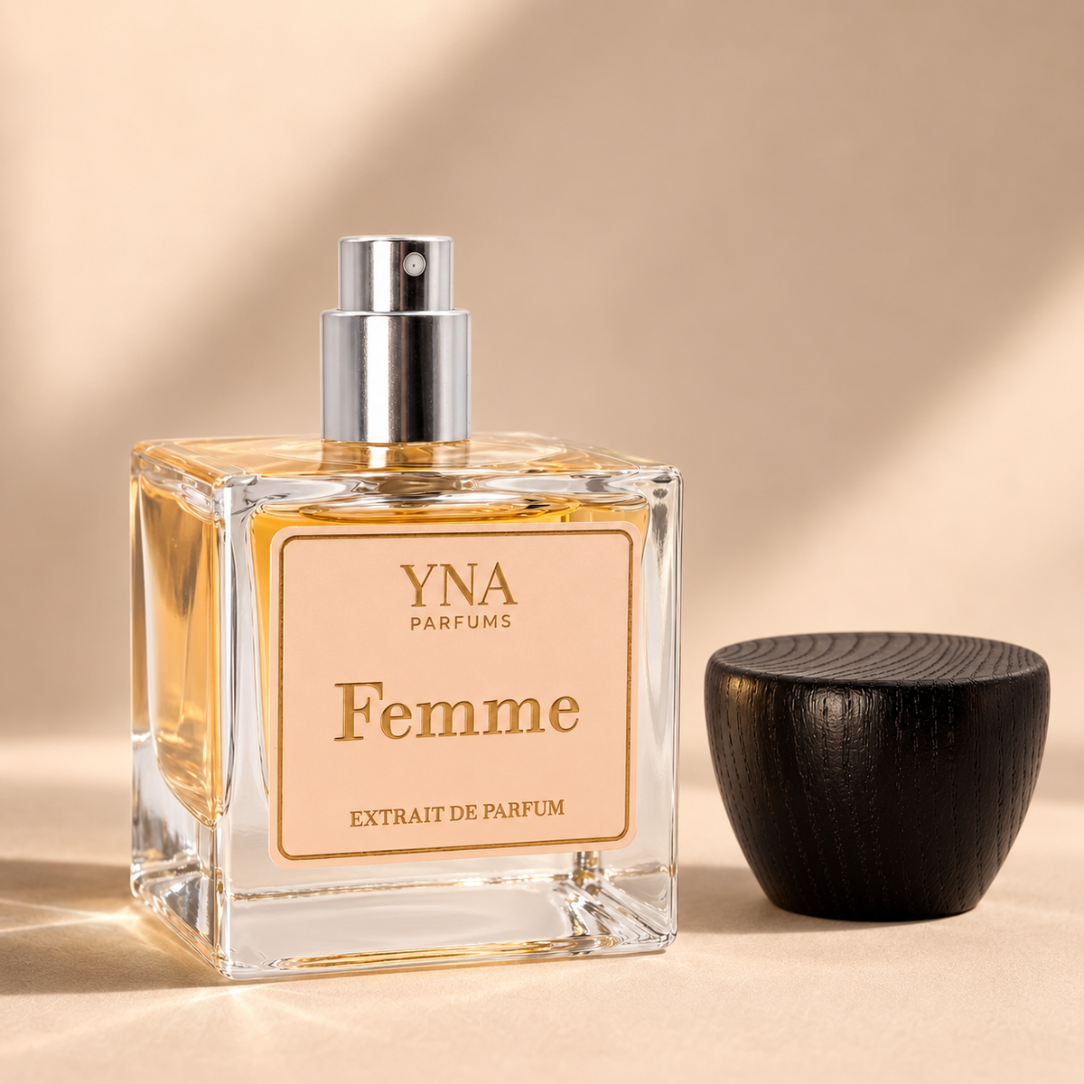 YNA Parfums Femme Extrait de Parfum 50ml with dark wood cap removed and placed beside the bottle